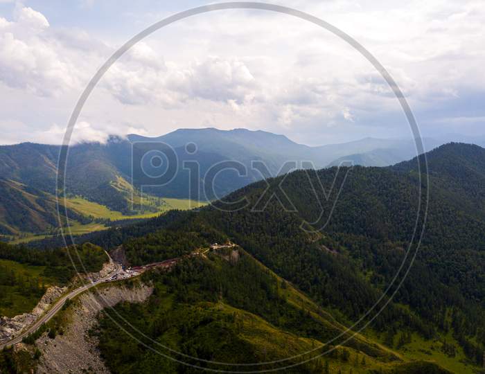 Landscape Mountain With Beautiful Forest  With Turquoise. Panoramic. Travel Background. Highway At Mountain. Quadrocopter Highlands