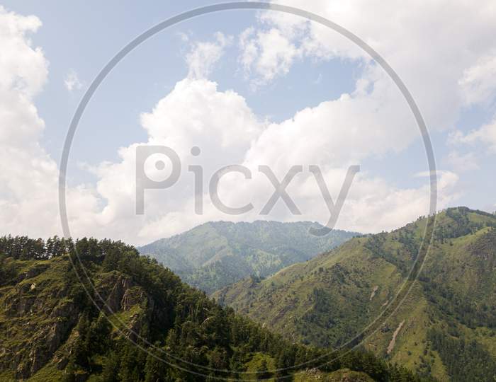 Landscape Mountain With Beautiful Forest  With Turquoise. Panoramic. Travel Background. Highway At Mountain. Quadrocopter Highlands