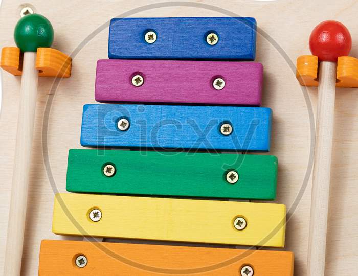 Close Up Pf The Colorful  Tone Toy Xylophone Made Of Metal And Wood . Educational Toy For For The Development Of Children