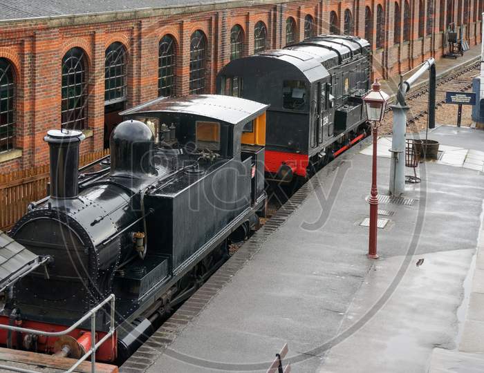 Two Old Trains Parked At Sheffield Park Station