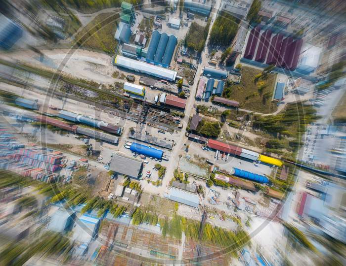Top View Of The Industrial Zone: Garages, Warehouses, Containers For Storing Goods. The Concept Of Storage Of Goods By Importers, Exporters, Wholesalers, Transport Enterprises, Customs