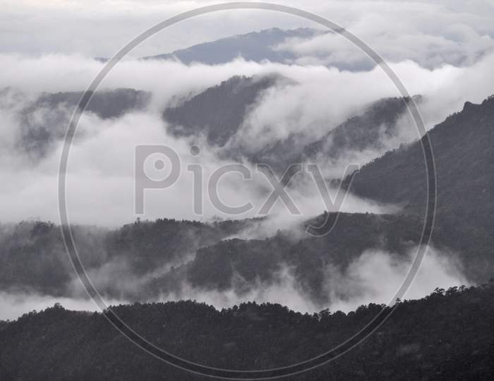 Ariel View Beautiful Ridges With Floating Cloud