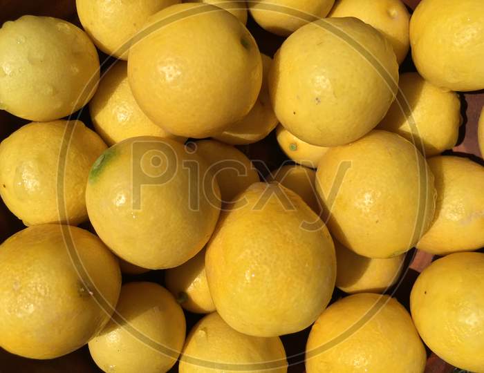 Lemons Display In Market Place