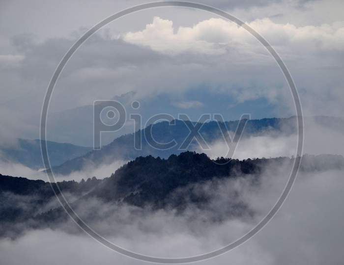 Panoramic View Of Ridges With Cloud, Silvery Mist