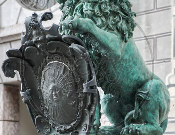 Statue Of  A Green Lion At Odeonsplatz In Munich