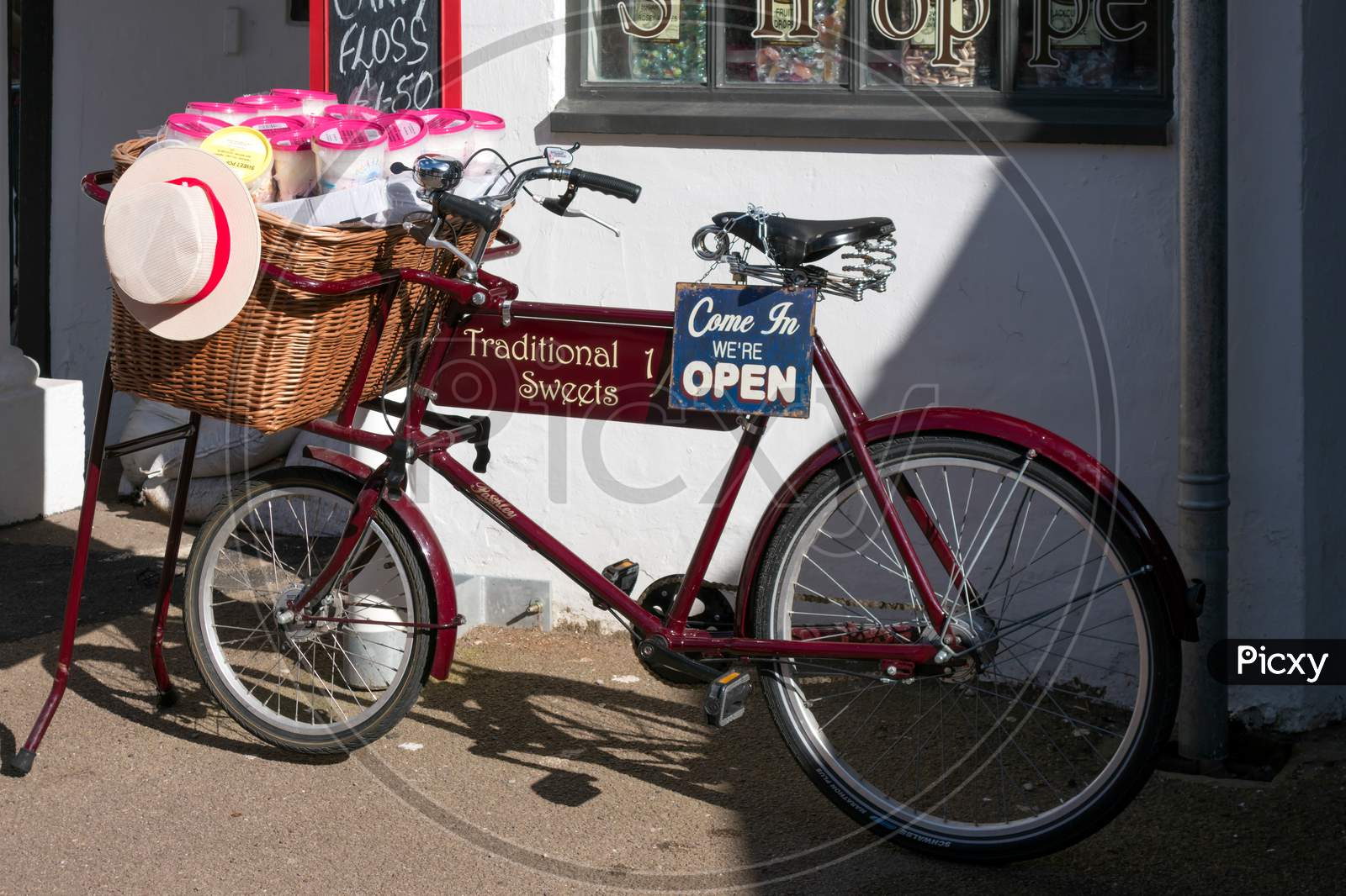 Penarth Wales Uk March 2014 - View Of An Old Tradesman Bicycle Outside A Sweet Shop In Penarth