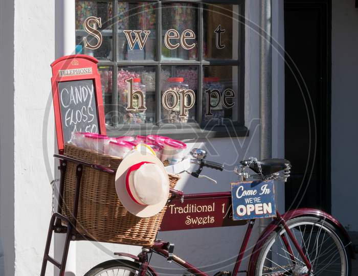Penarth Wales Uk March 2014 - View Of An Old Tradesman Bicycle Outside A Sweet Shop In Penarth