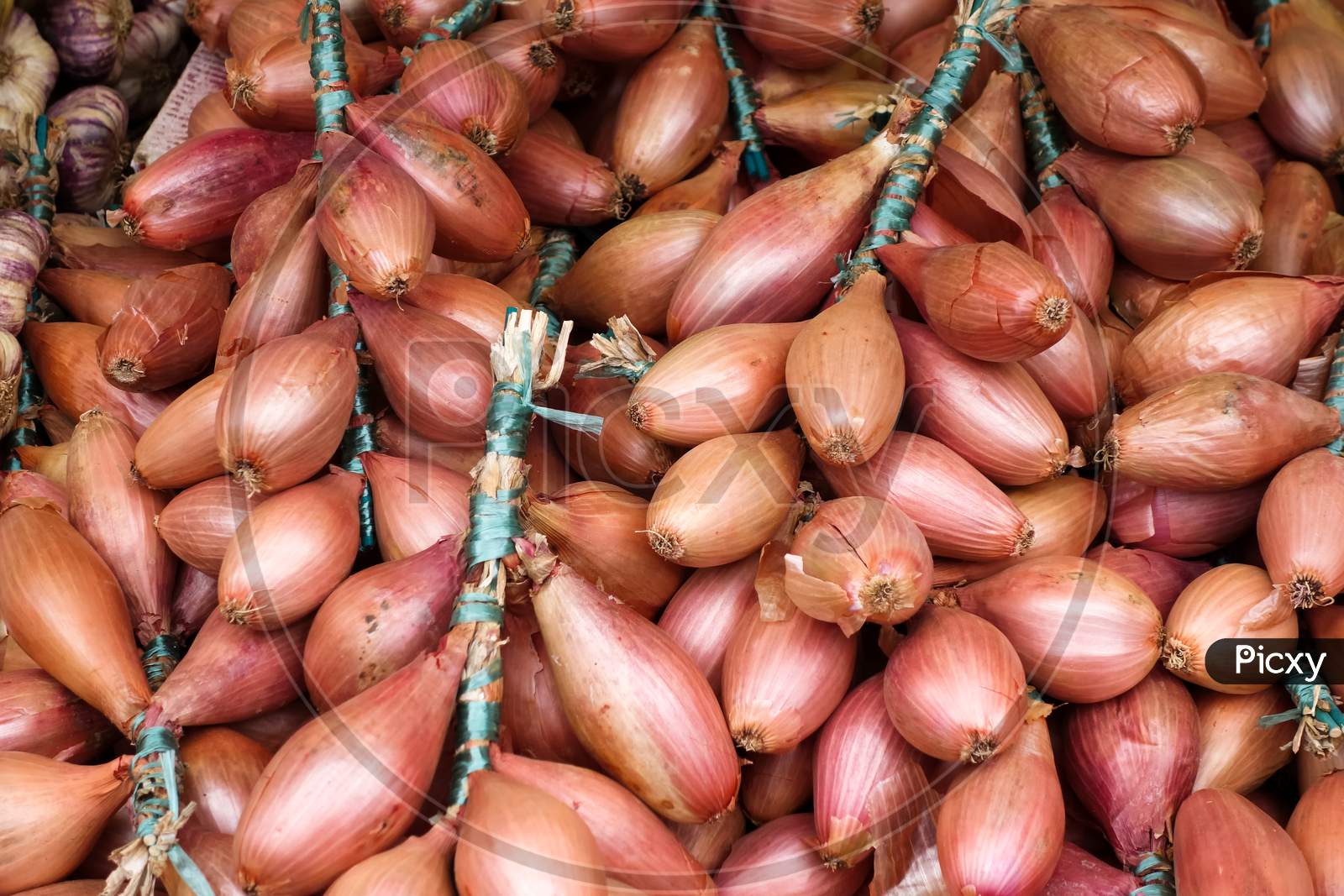 Onions For Sale On A Market Stall In Bergamo