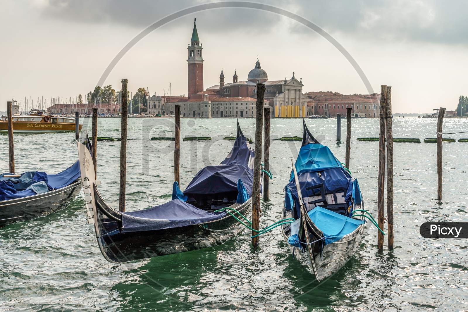 Gondolas Moored At The Entrance To The Grand Canal