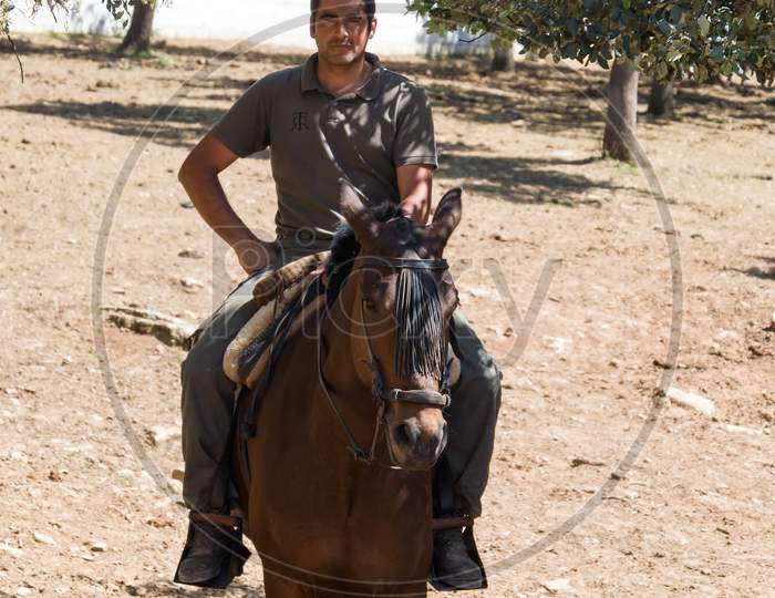Ronda, Andalucia/Spain - May 8 : Horse Rider At A Farm Near Ronda Spain On May 8, 2014. Unidentified Man.