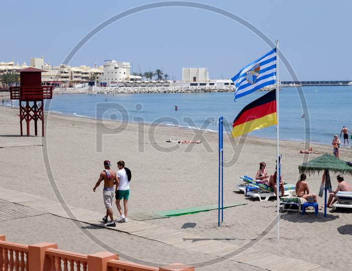 Benalmadena, Andalucia/Spain - May 9 : Beach Scene At Benalmadena Spain On May 9, 2014. Unidentified People.