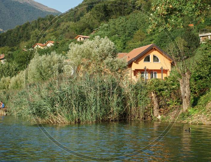 Boys Fishing At San Felice On Lake Endine Near Bergamo