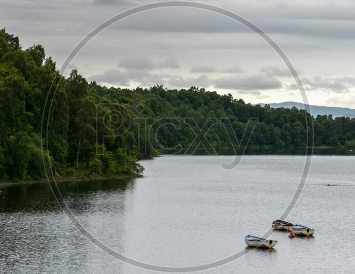 Rowing Boats Moored On Loch Insh