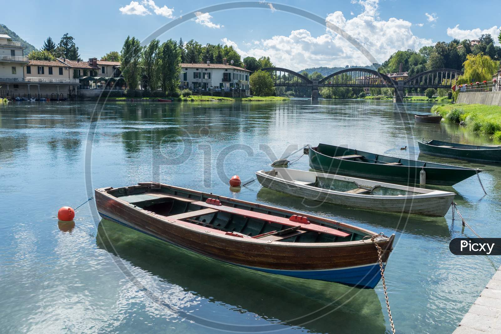 Boats Moored On The Adda River At Brivio Lombardy Italy