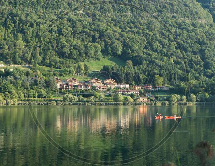 People Kayakings At Lake Endine Near Bergamo