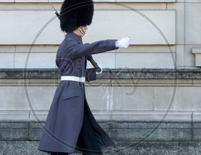 Guard In Greatcoat Parading At Buckingham Palace