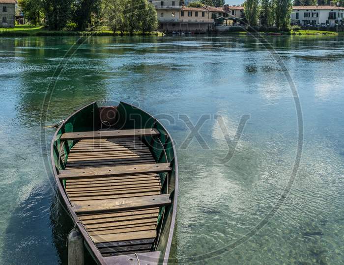 Boat Moored On The Adda River At Brivio Lombardy Italy