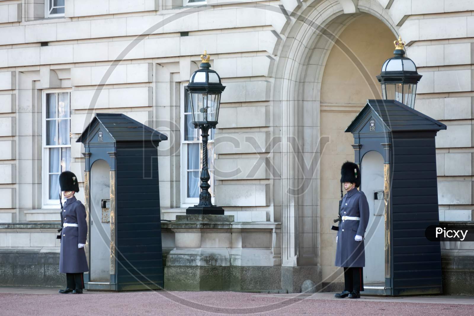 Guards In Greatcoats On Sentry Duty At Buckingham Palace