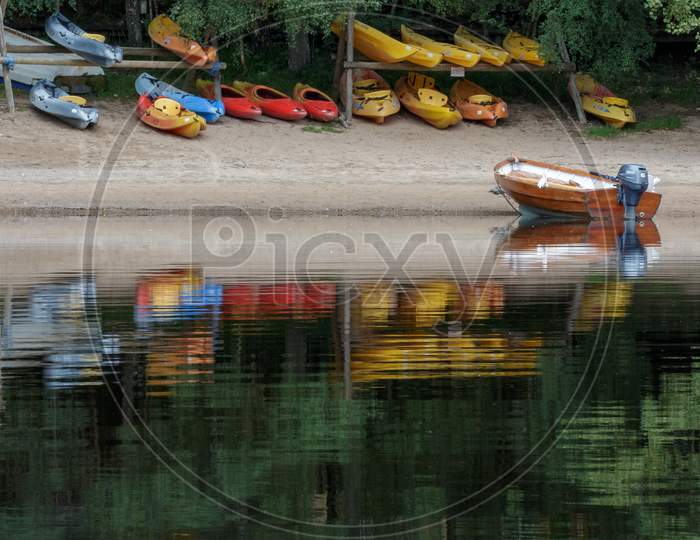 Rowing Boats Moored On Loch Insh