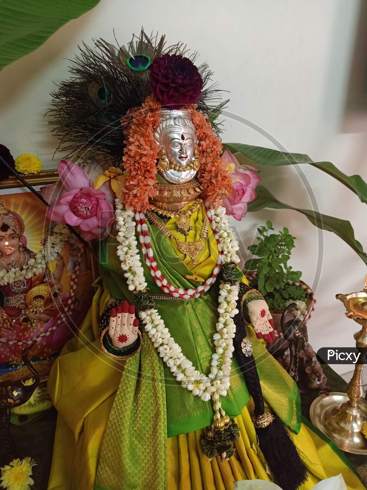 Image of Celebrating traditional Varalakshmi Vratam pooja in home