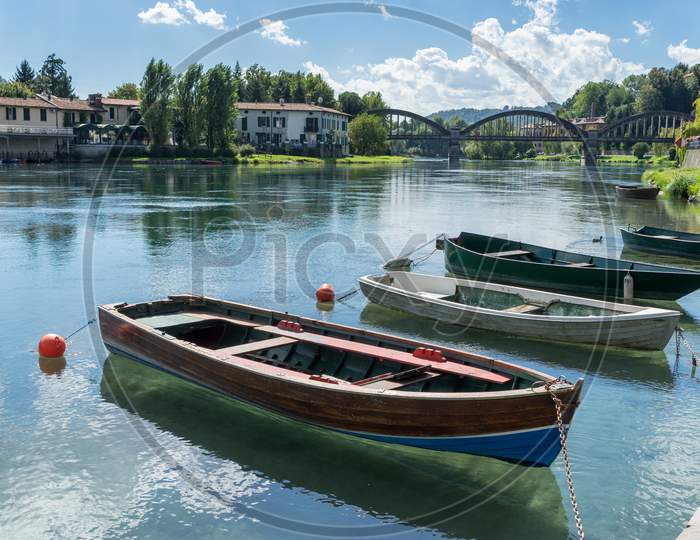 Boats Moored On The Adda River At Brivio Lombardy Italy
