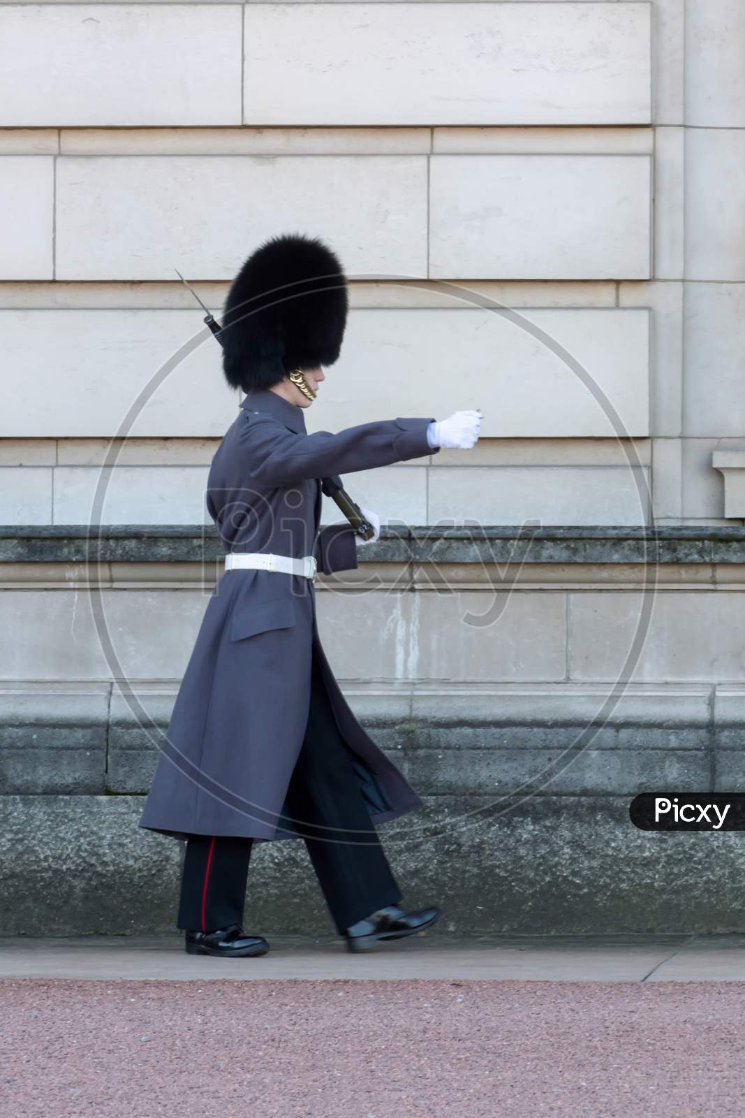 Guard In Greatcoat Parading At Buckingham Palace