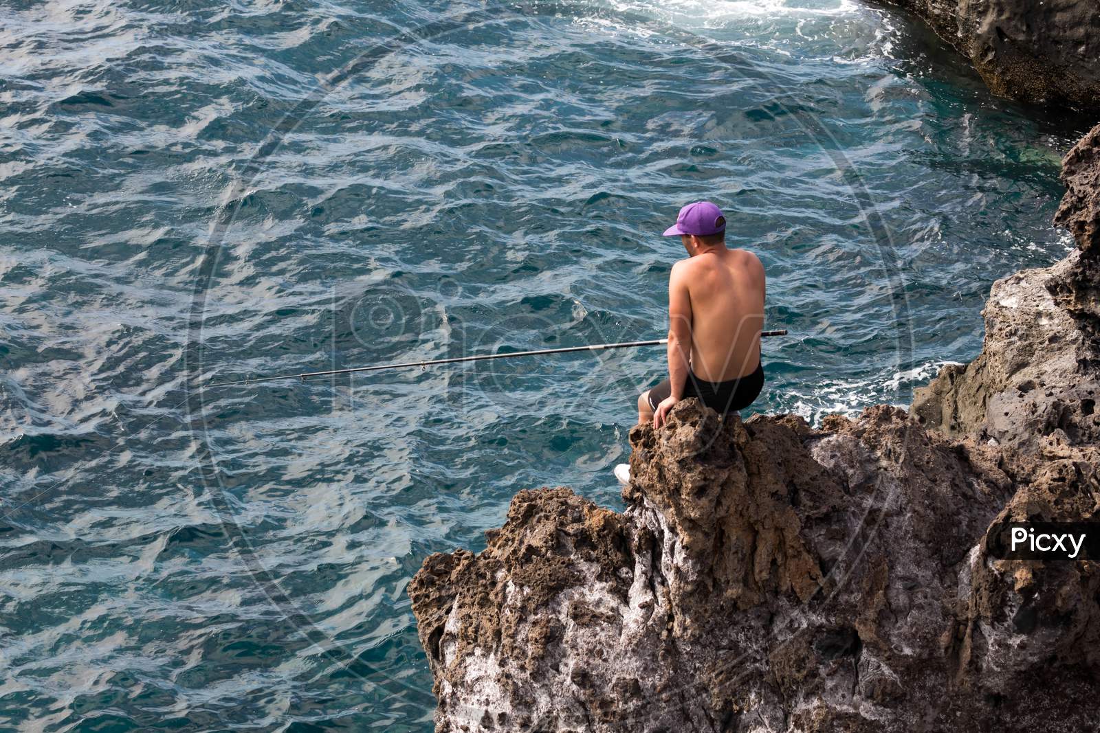 Man Fishing In Callao Salveje Tenerife