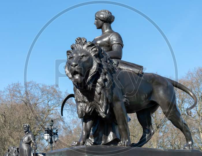 Statue On The Queen Victoria Memorial Outside Buckingham Palace In London