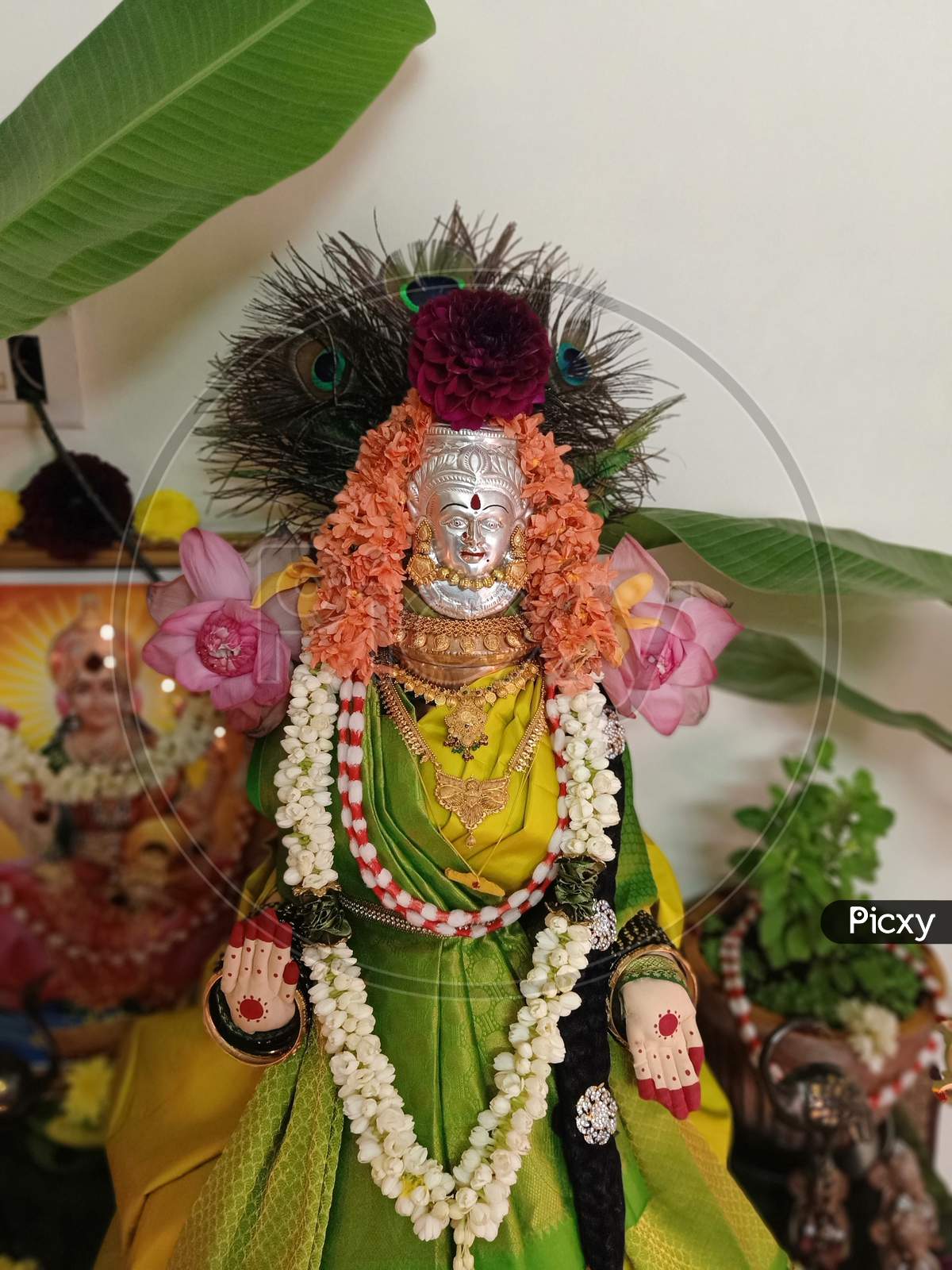 Varalakshmi Vratham Pooja Decor | Goddess decor, Diwali decorations at  home, Ganpati decoration design