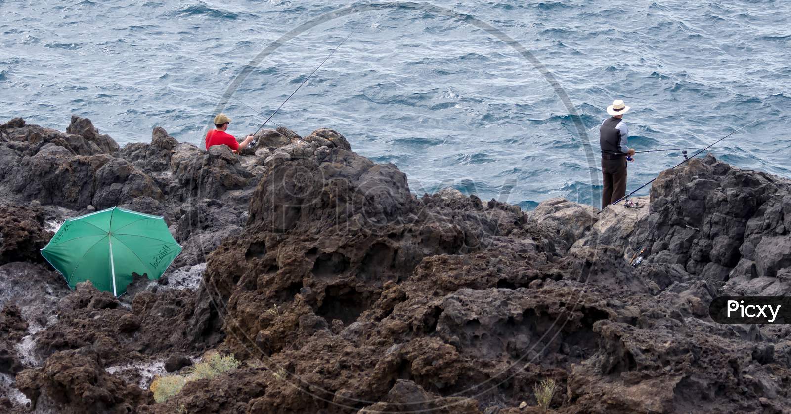 Men Fishing In Callao Salveje Tenerife