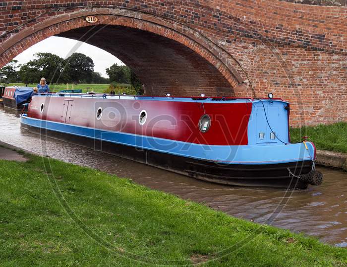 Narrow Boat Travelling Along The Shropshire Union Canal
