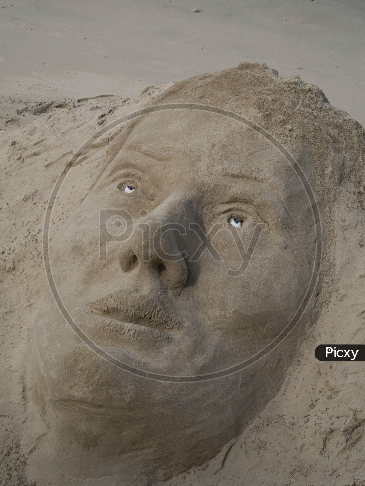 Sand Sculpture On The Bank Of The River Thames