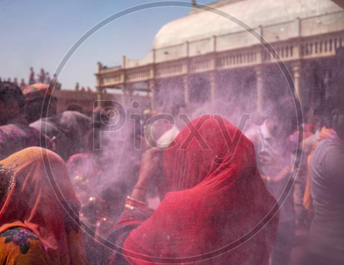 People Playing With Colors In Nandgaon Holi
