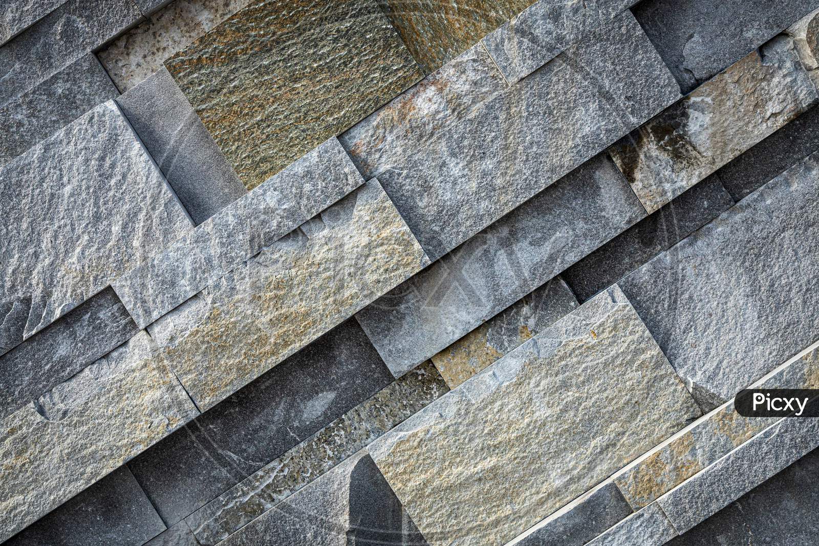 Background Of Gray And Brown Stone Wall Made With Blocks . Pattern Of Slate Wall Texture And Background
