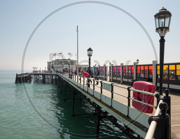 Worthing, West Sussex/Uk - April 20 : View Of Worthing Pier In West Sussex On April 20, 2018. Unidentified People