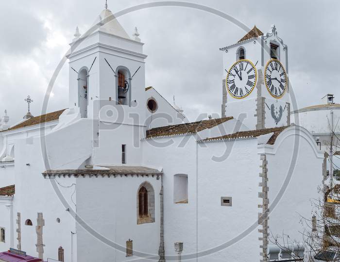 Tavira, Southern Algarve/Portugal - March 8 : Tourist Train Arrives At Santa Maria Do Castelo Church In Tavira Portugal On March 8, 2018. Unidentified People