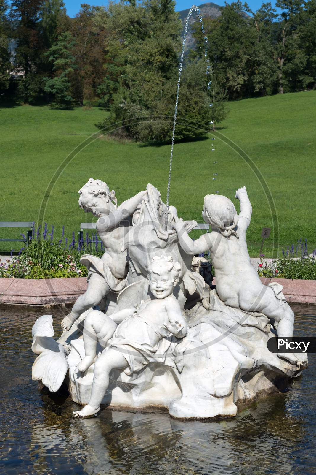 Ornamental Statues In A Pond Outside The Imperial Kaiservilla In Bad Ischl