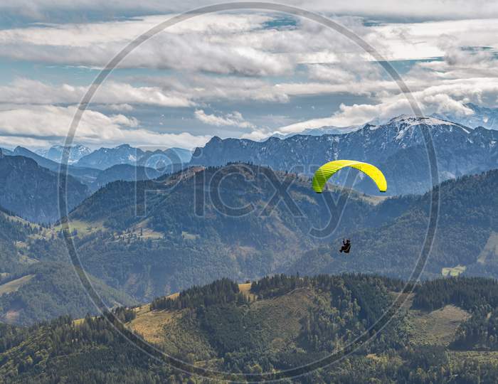 Hang-Gliding Above The Countryside Around Zwölferhorn Mountain