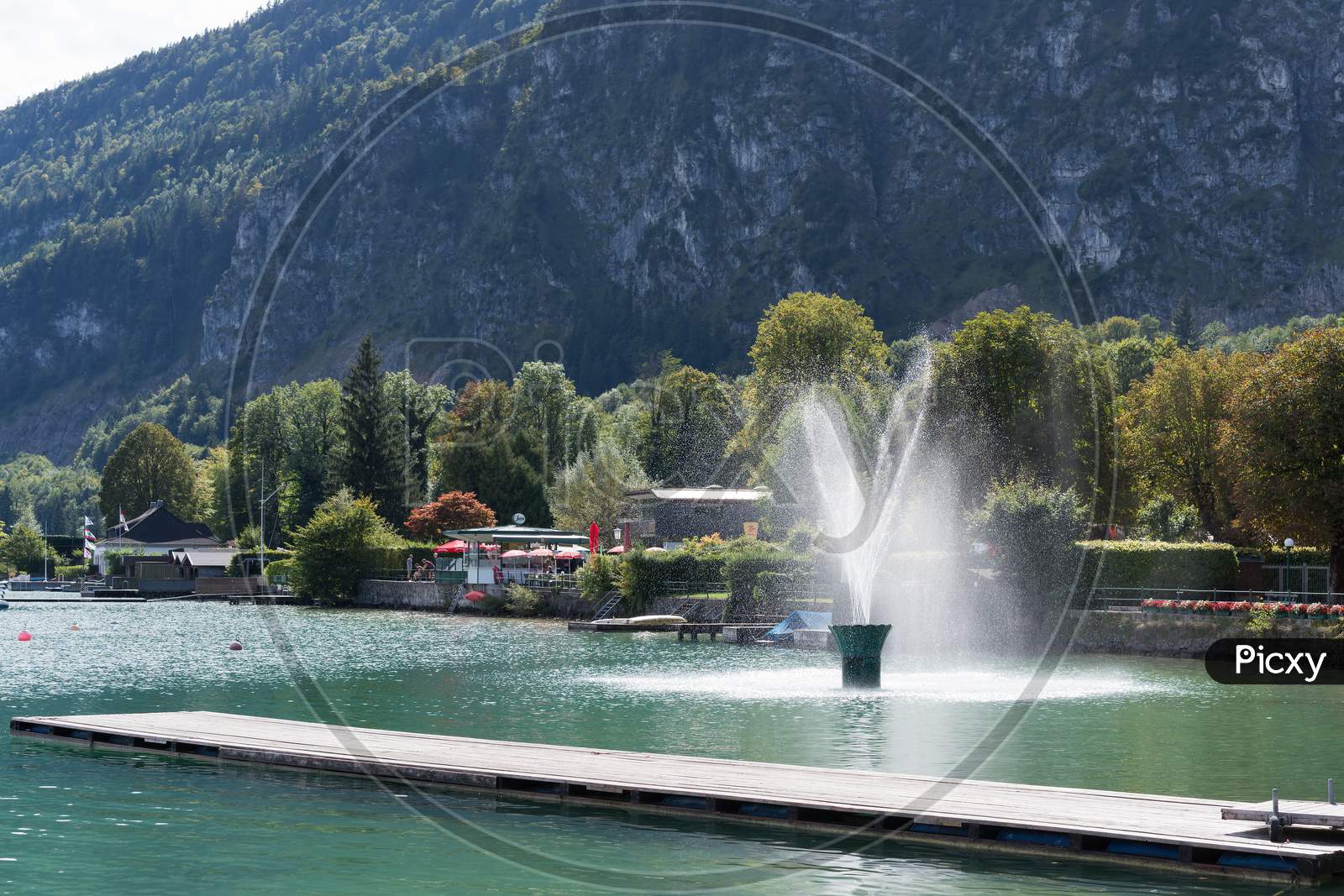 Fountain In Lake Wolfgang At St. Gilgen