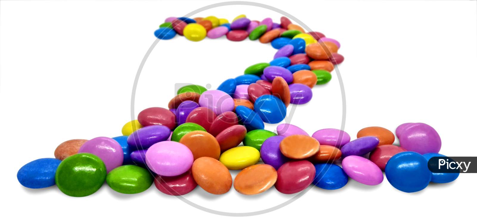 Beautiful Candy Gems on White in the shape of  Numbers, Colored sugar coated fennel seed isolated on white
