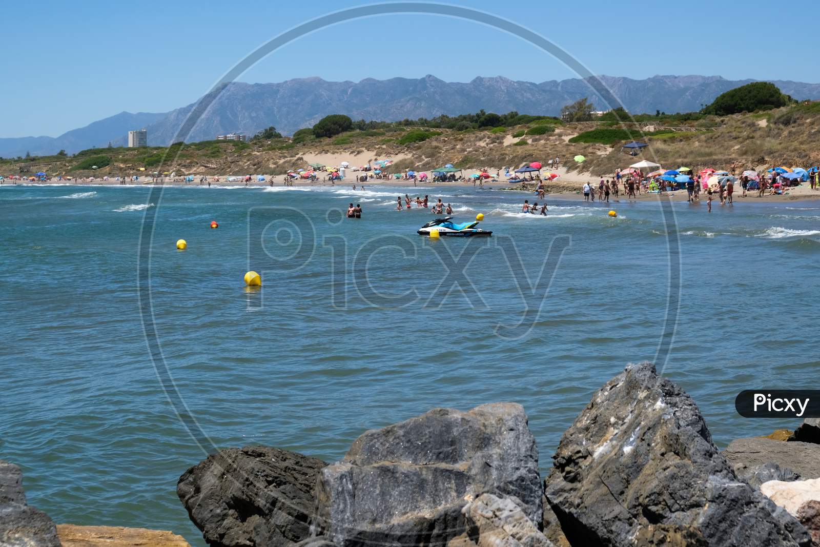 Cabo Pino, Andalucia/Spain - July 2 : People Enjoying The Beach At Cabo Pino Andalucía Spain On July 2, 2017. Unidentified People.