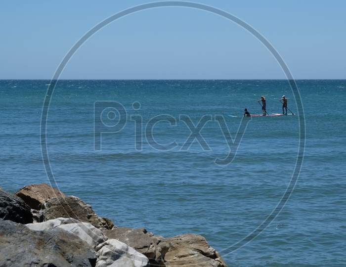 Cabo Pino, Andalucia/Spain - July 2 : People Paddle Boarding At Cabo Pino Andalucía Spain On July 2, 2017. Unidentified People.