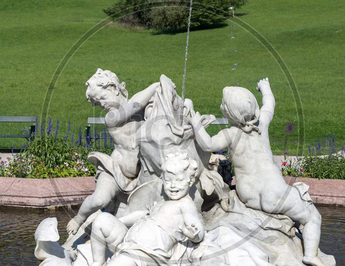Ornamental Statues In A Pond Outside The Imperial Kaiservilla In Bad Ischl