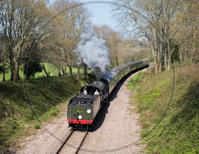 Steam Train On The Bluebell Railway Line In Sussex