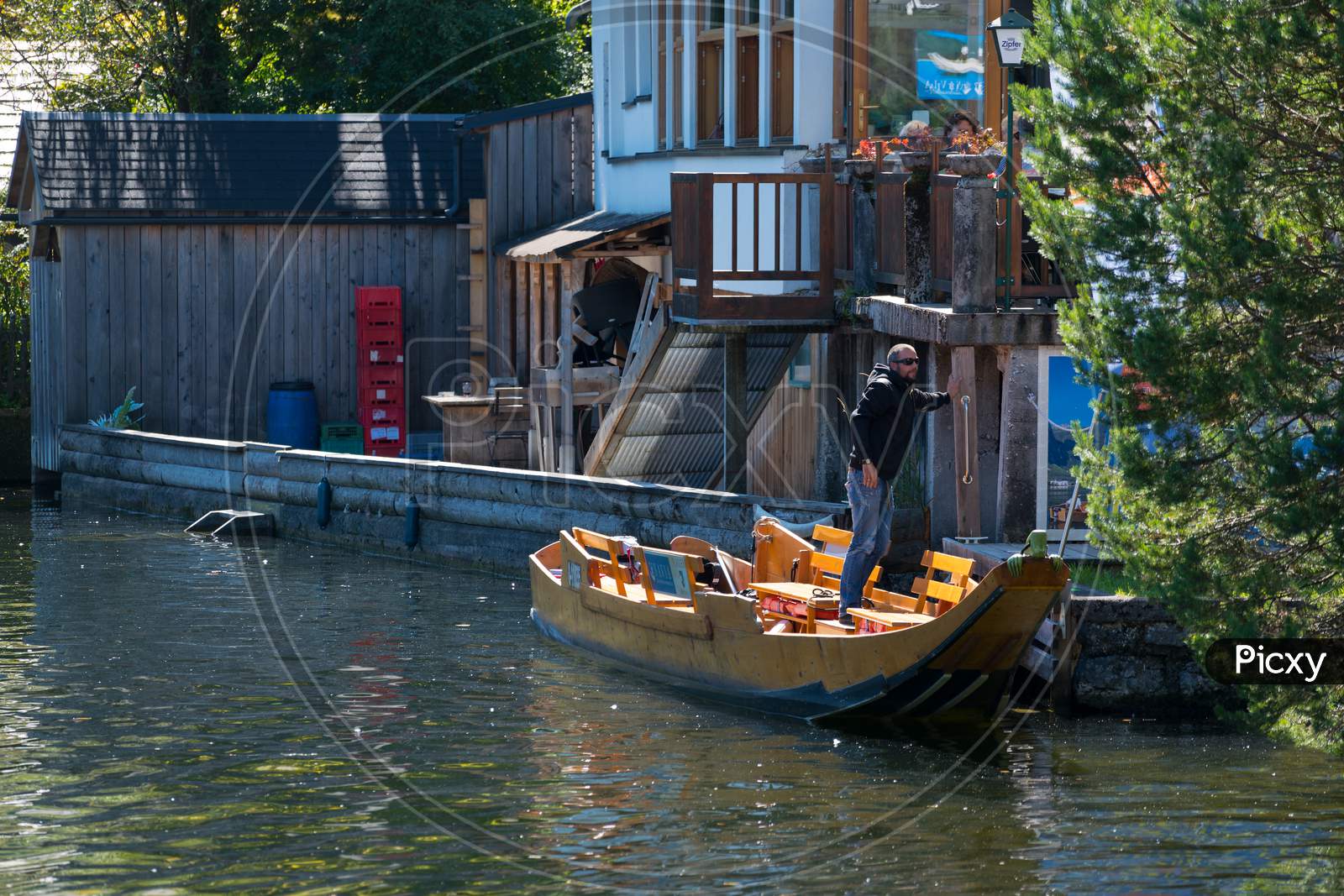 Traditional Flat Bottomed Boat On Lake Hallstatt