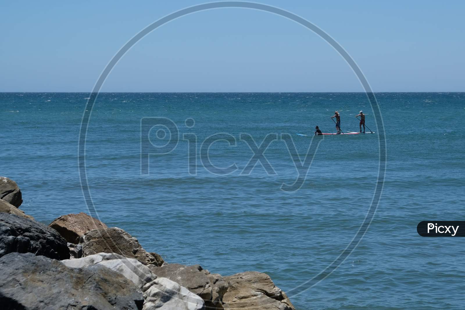 Cabo Pino, Andalucia/Spain - July 2 : People Paddle Boarding At Cabo Pino Andalucía Spain On July 2, 2017. Unidentified People.