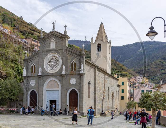 Riomaggiore, Liguria/Italy  - April 21 : Church Of San Giovanni Battista In Riomaggiore Liguria Italy On April 21, 2019. Unidentified People