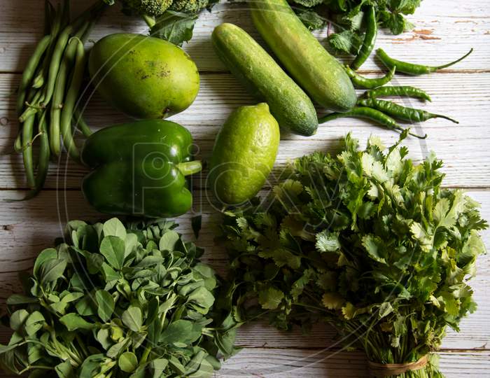 All natural green vegetables on a background.