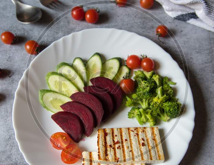 Top view of grilled steak with vegetables