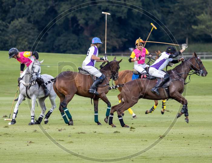 Midhurst, West Sussex/Uk - September 1 : Playing Polo In Midhurst, West Sussex On September 1, 2020. Four Unidentified People